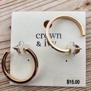 Gold hoop earrings with blue accent.